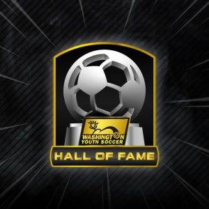 Hall of Fame Emblem With Soccer Ball Trophy Behind Sign